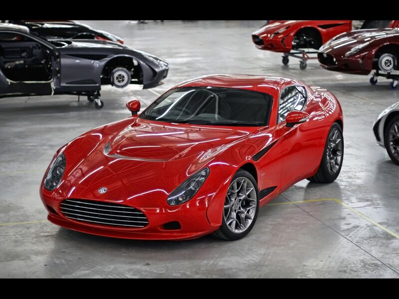 Red sports car in factory