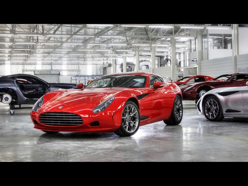 Red sports car in factory