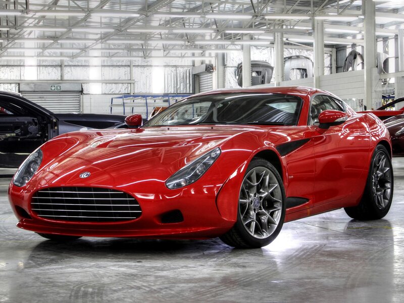 Red sports car in factory