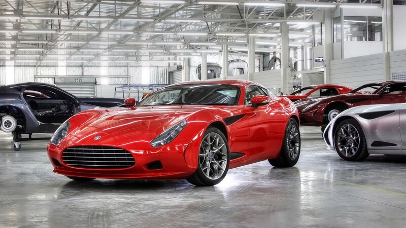 Red sports car in factory