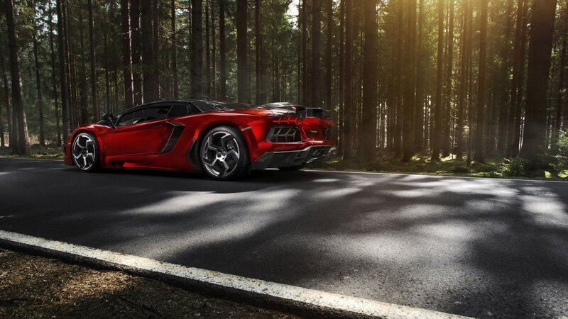 Red sports car in forest