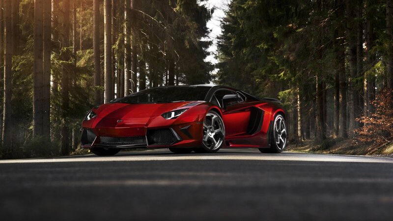 Red sports car in forest