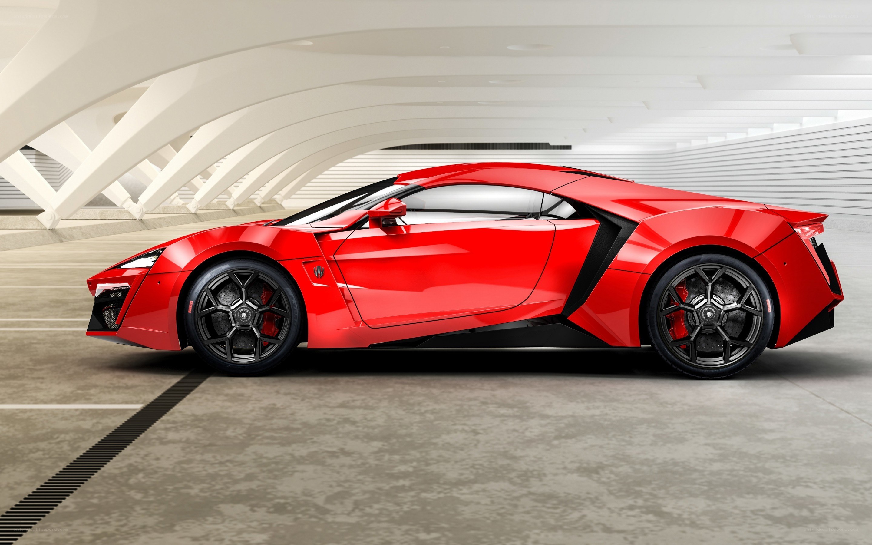 red sports car in garage