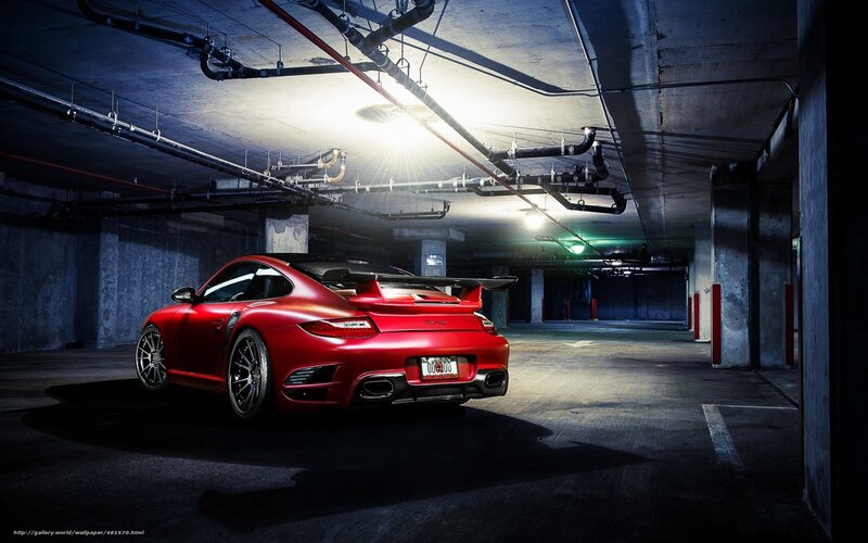 Red sports car in garage