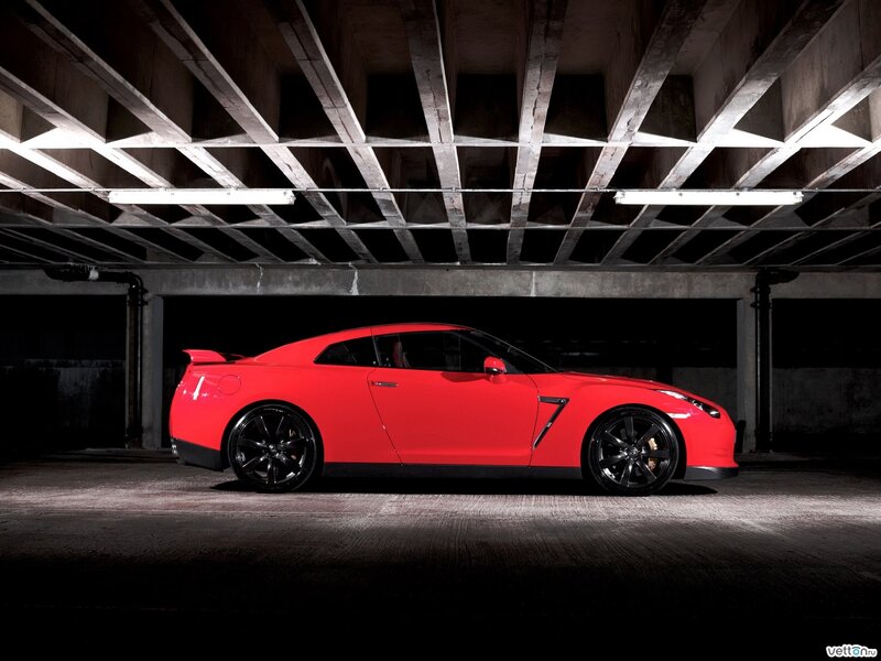 Red sports car in garage