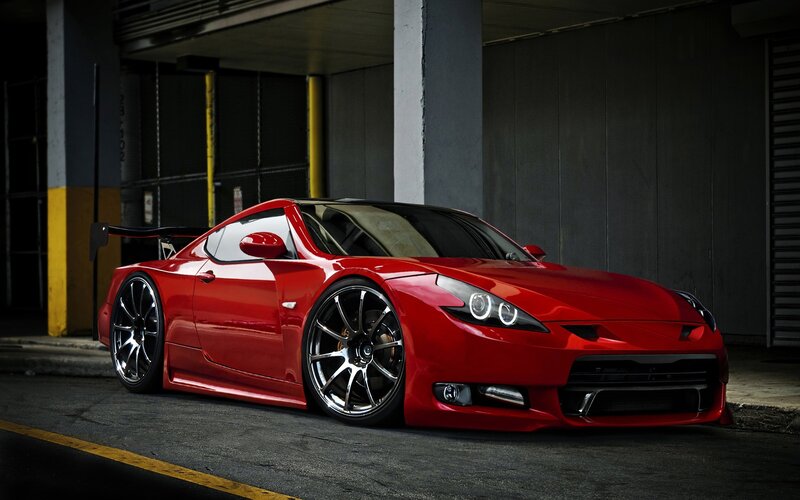 red sports car in garage