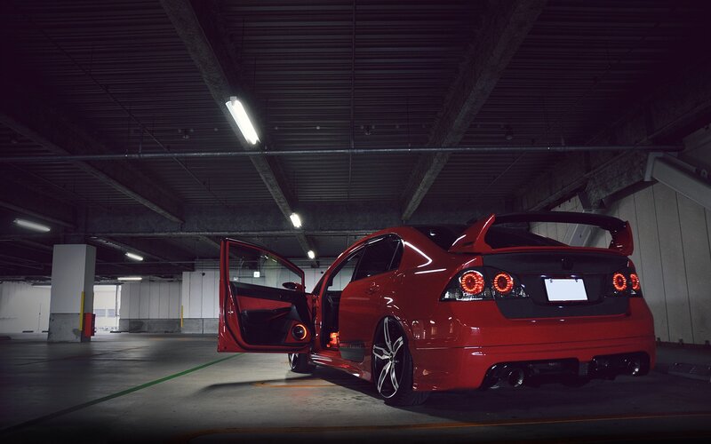 red sports car in garage