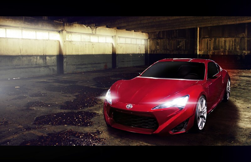 Red sports car in garage