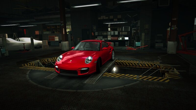 Red sports car in garage