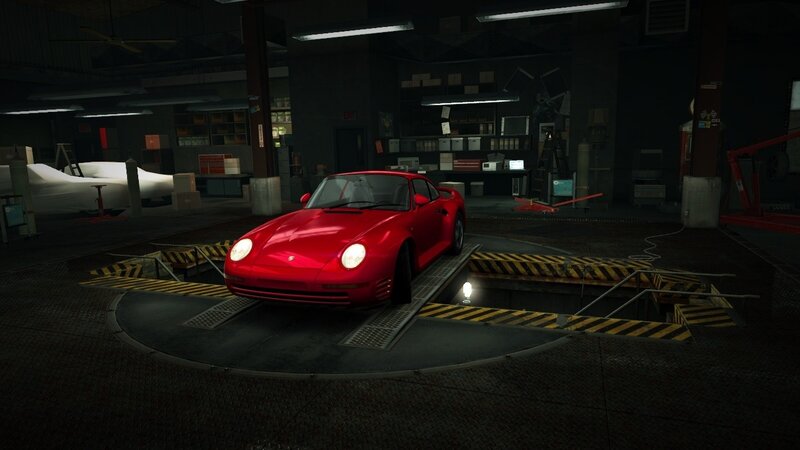 red sports car in garage