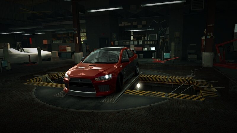 Red sports car in garage