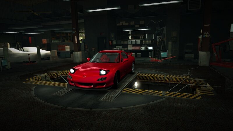 Red sports car in garage