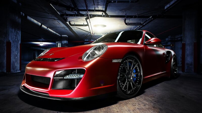 red sports car in garage