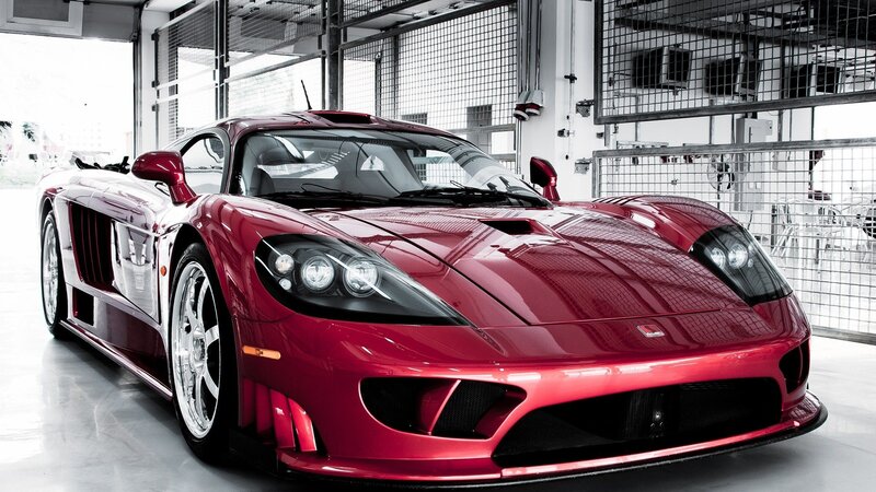 red sports car in garage