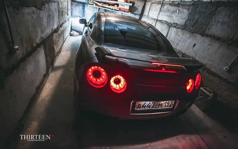 Red Sports Car in Garage — Dramatic, Night