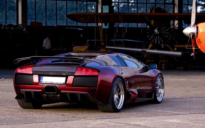 Red sports car in hangar