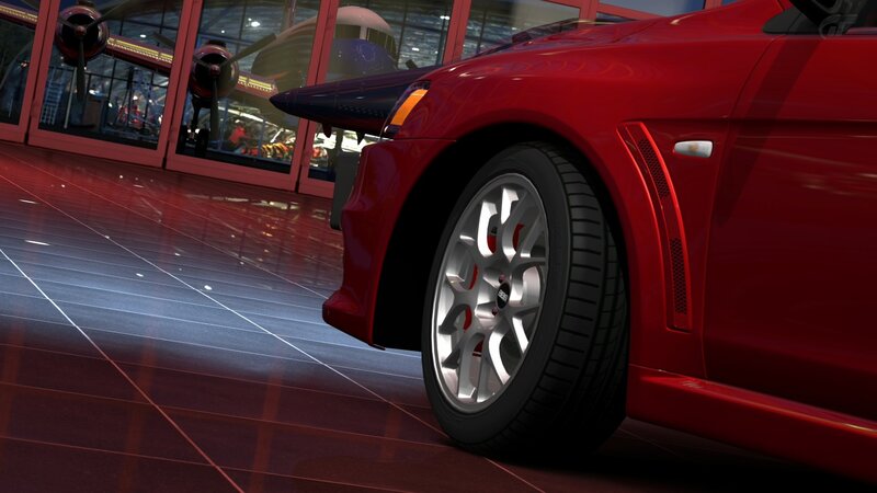 Red sports car in hangar