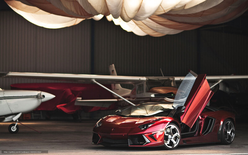 Red Sports Car in Hangar — Dramatic, Photograph, Airplane