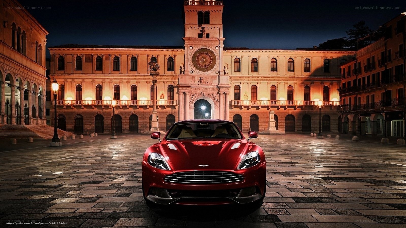 Red sports car in historic square