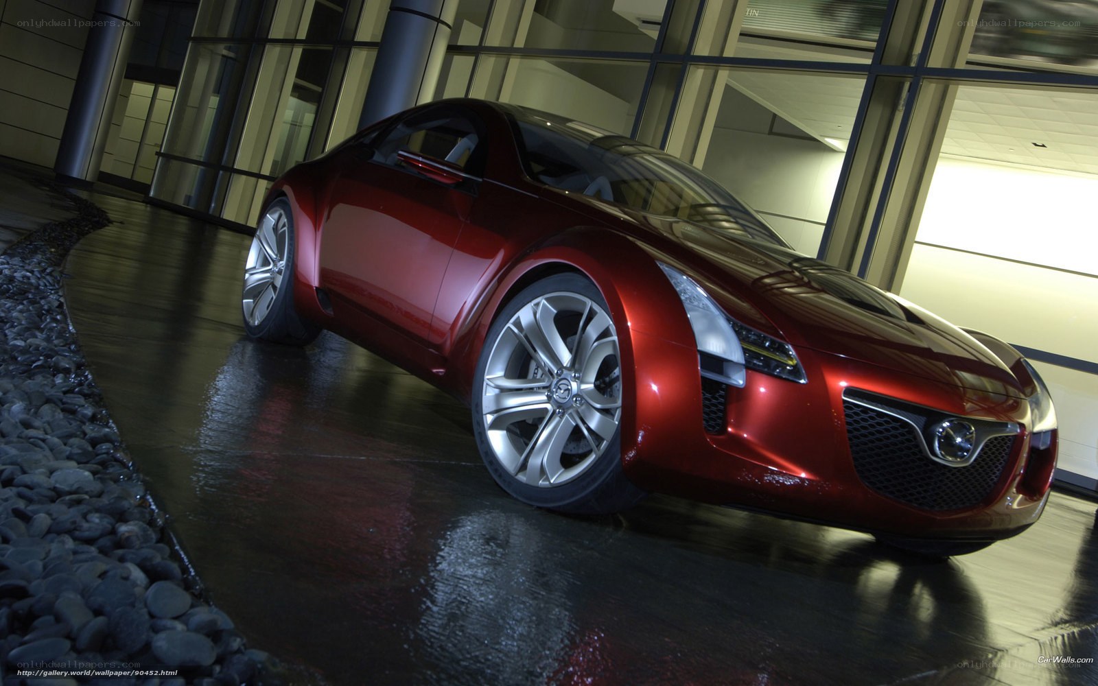 Red sports car in modern setting