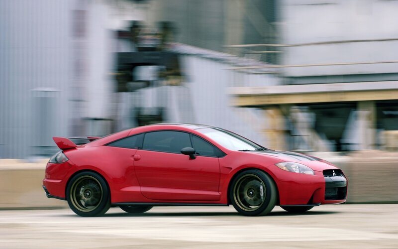 Red sports car in motion