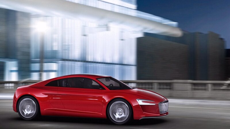 Red sports car in motion