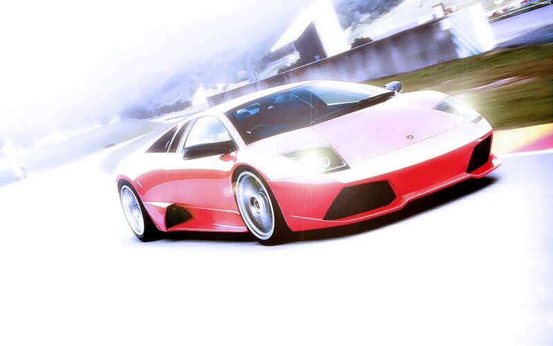 Red sports car in motion