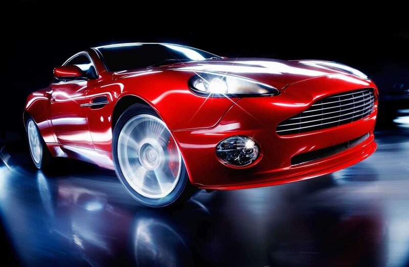 Red sports car in motion