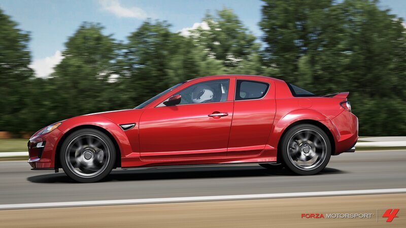 Red sports car in motion