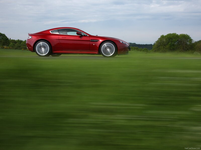 Red sports car in motion