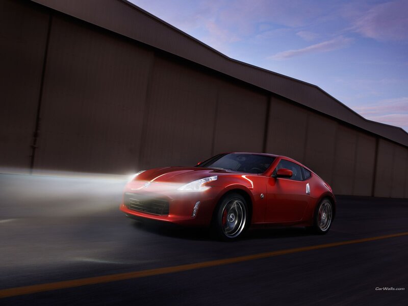 Red sports car in motion