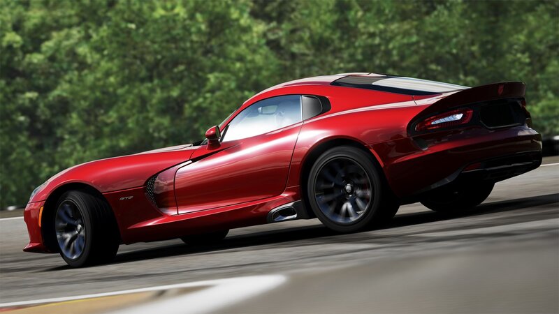 red sports car in motion