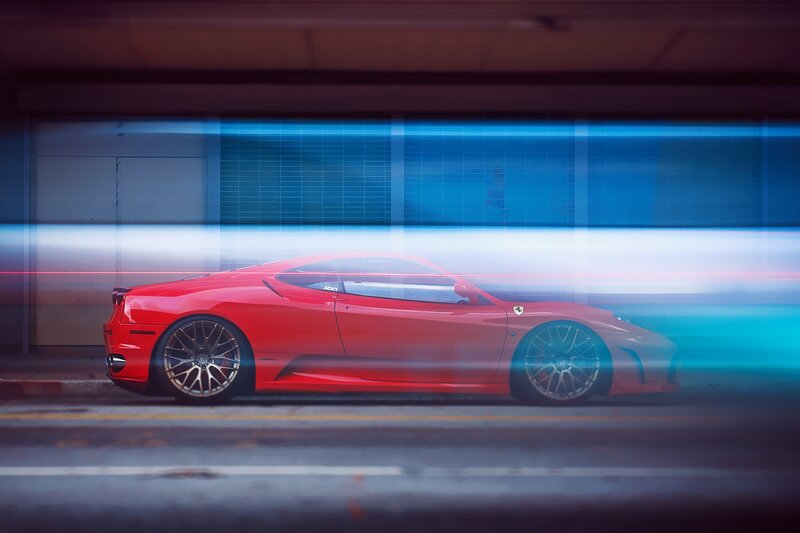 Red sports car in motion