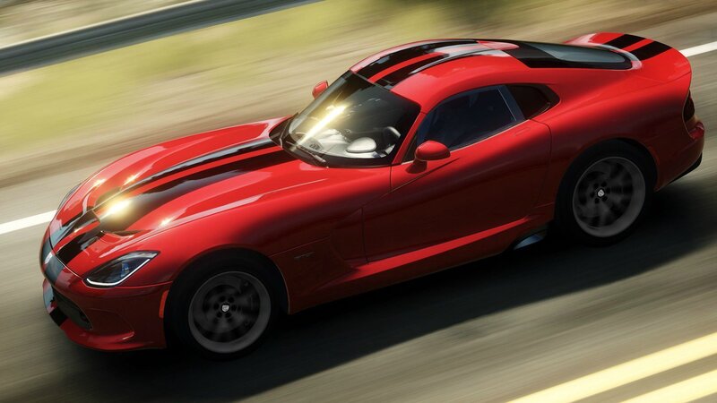 Red sports car in motion