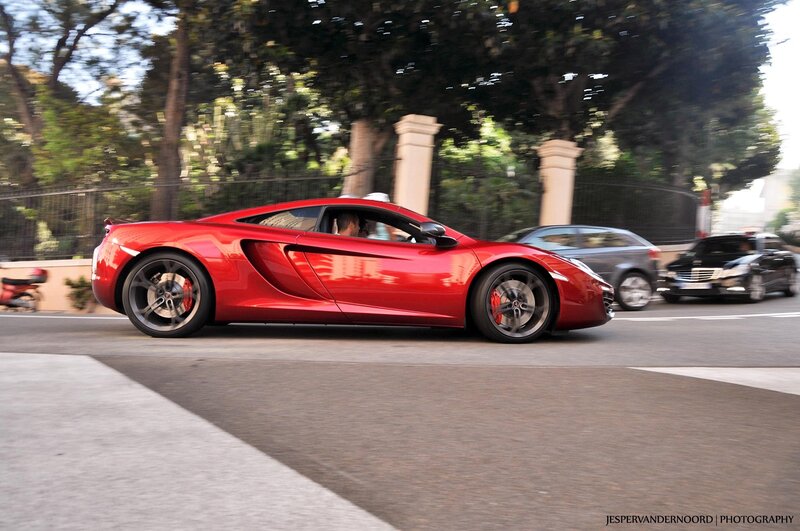 Red sports car in motion