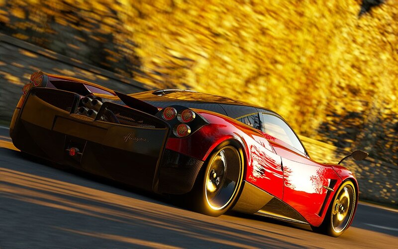 red sports car in motion