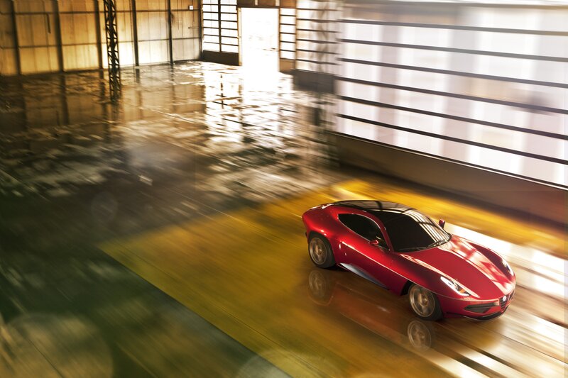 Red sports car in motion
