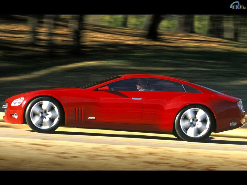 Red sports car in motion