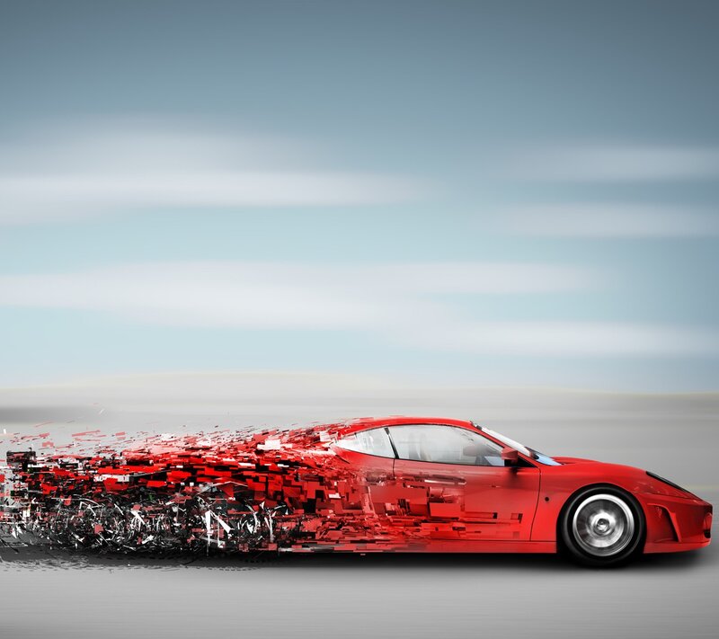 Red sports car in motion