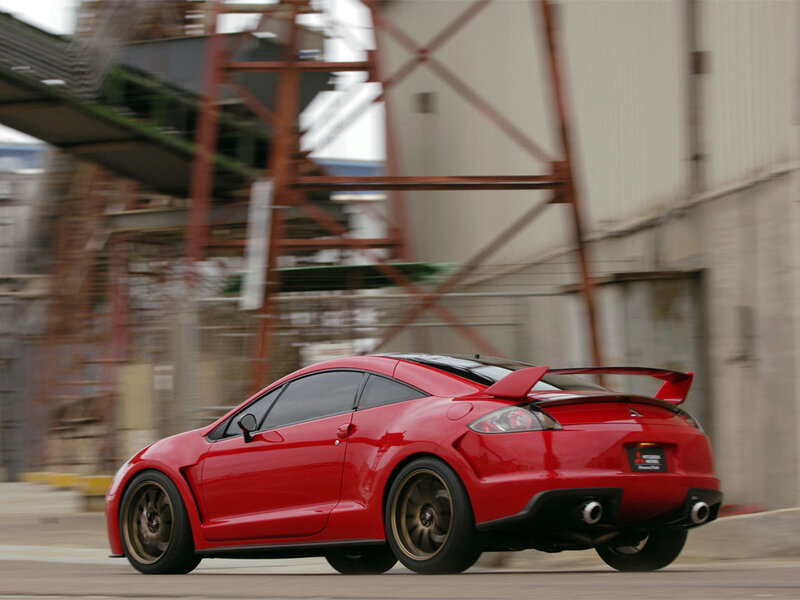 red sports car in motion