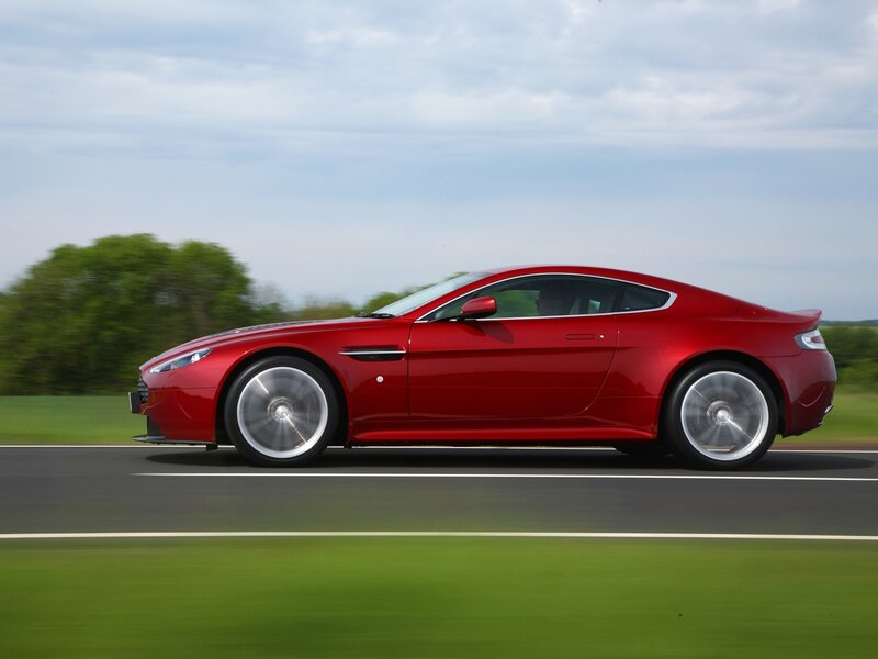 Red sports car in motion