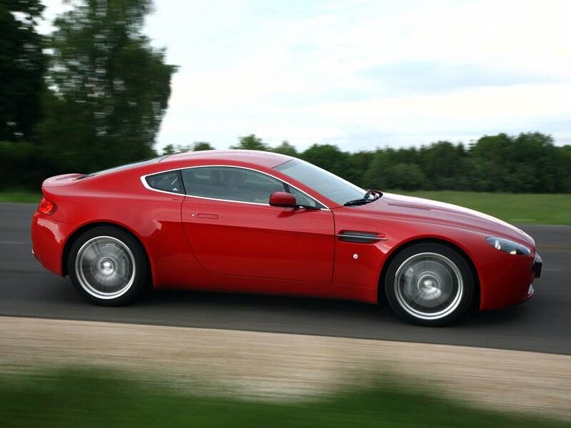 Red sports car in motion