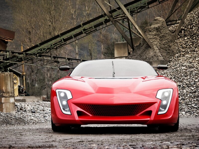 Red sports car in quarry