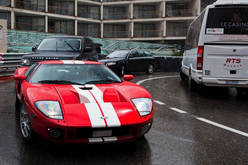 Red sports car in rain