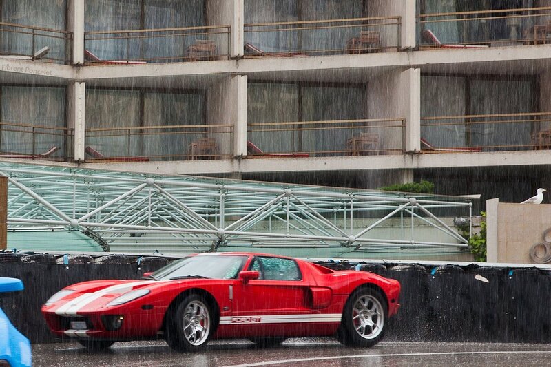 Red sports car in the rain