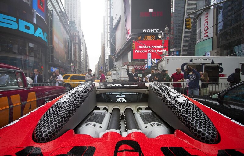Red sports car in Times Square