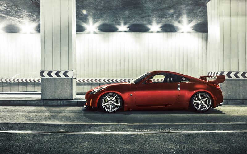 Red sports car in tunnel