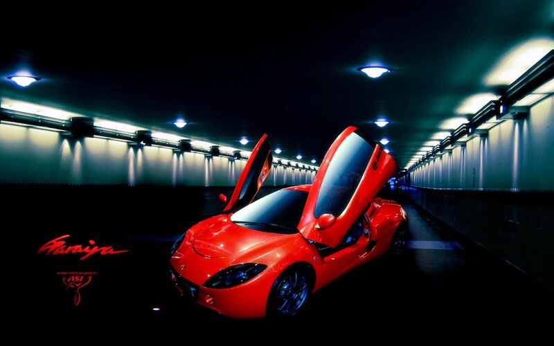 Red sports car in tunnel
