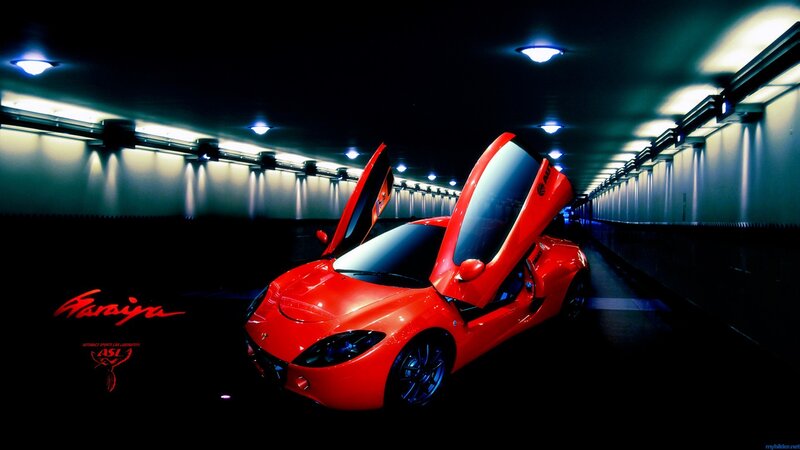 Red sports car in tunnel