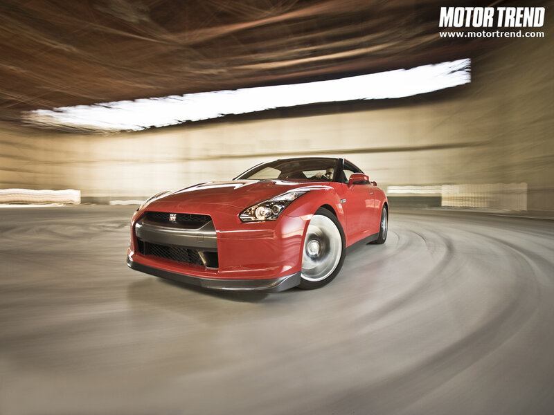 Red sports car in tunnel